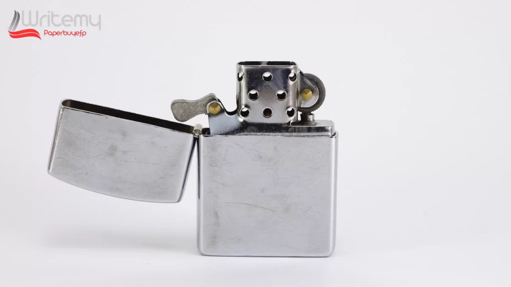 A clean, metal Zippo lighter with its lid open, displayed against a white background. Can You Use Zippo Lighter Fuel as a Lubricant is discussed in relation to this iconic lighter.